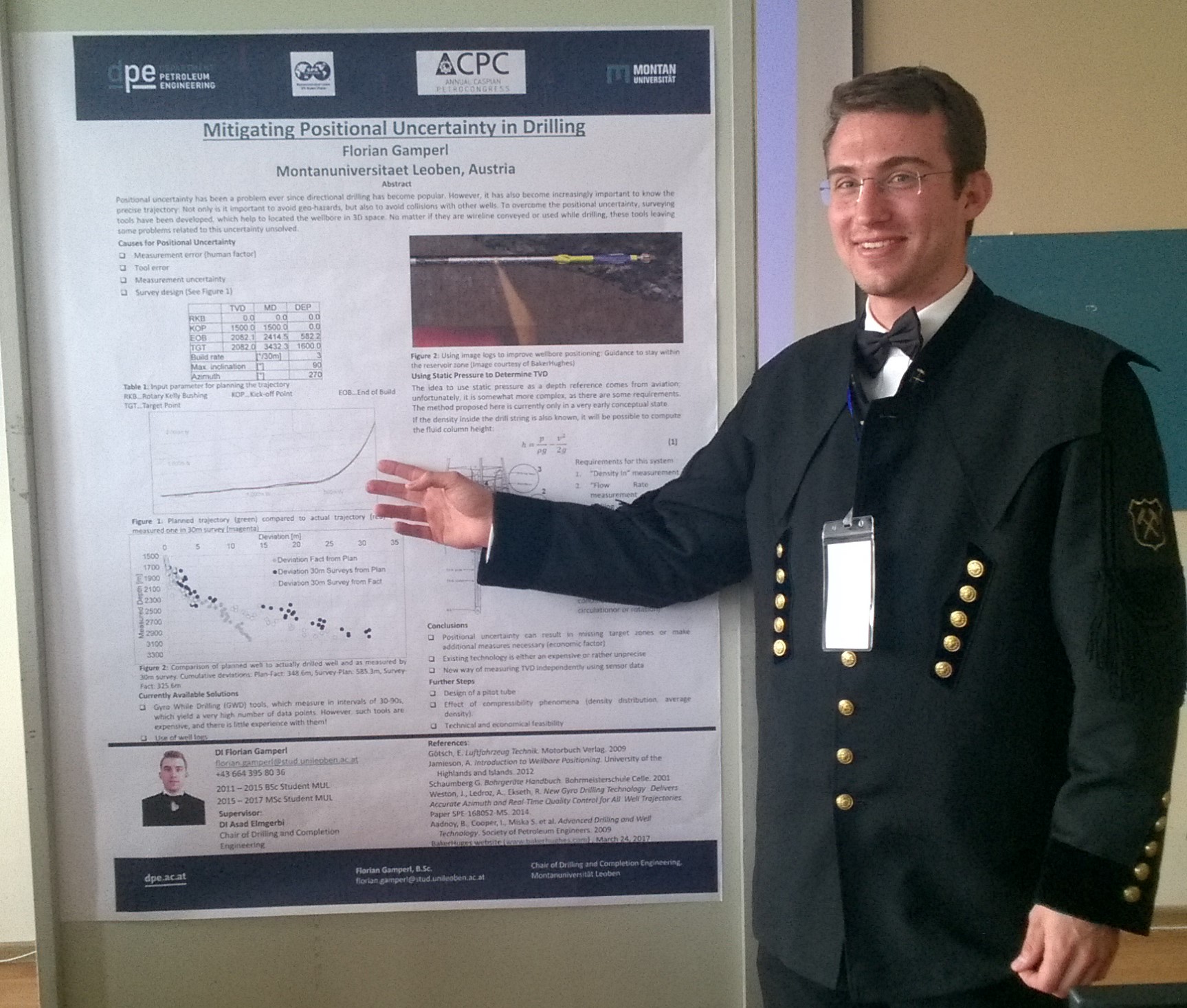 Florian defending his research work in the form of a poster